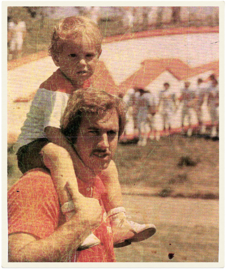 Young Darren on his father's shoulders